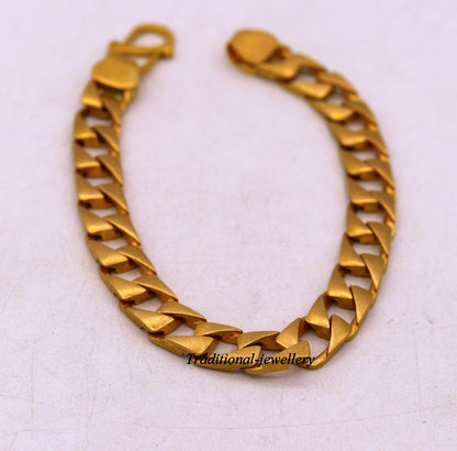 22kt yellow gold handmade solid Cuban chain bracelet, 9mm wide, heavy men's jewelry with hallmarked 916 from Tribal Ornaments.