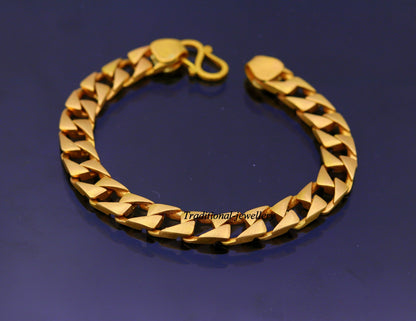 22kt yellow gold handmade solid Cuban chain bracelet, 9mm wide, heavy men's jewelry with hallmarked 916 from TRIBAL ORNAMENTS.