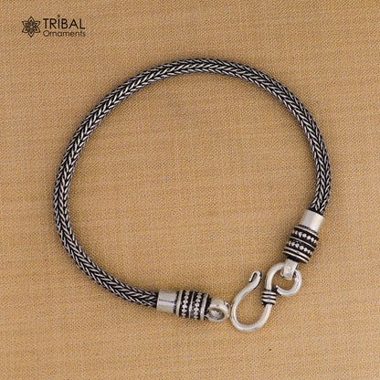 Sterling silver wheat chain bracelet by Tribal Ornaments, stylish unisex jewelry featuring a 7-inch silver bracelet with intricate chain links.