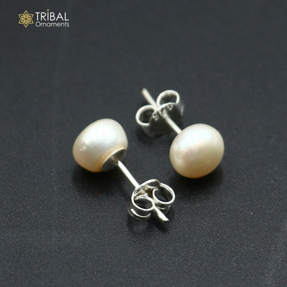 Round 7mm sterling silver stud earrings with pearl stones from Tribal Ornaments, unisex fancy jewelry for daily wear.