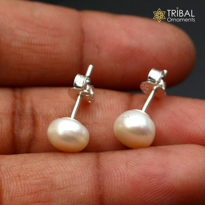 Round 7mm sterling silver stud earrings with pearl stones from TRIBAL ORNAMENTS, unisex jewelry for daily wear.