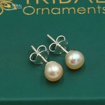 Round 925 sterling silver stud earrings with lustrous pearl stones, unisex jewelry, perfect for daily wear by Tribal Ornaments.