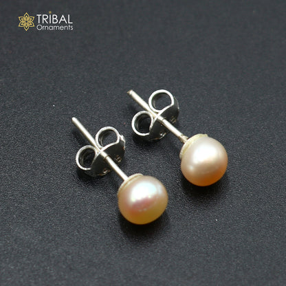 Round 7mm sterling silver stud earrings with luminous pearl stones, unisex jewelry by TRIBAL ORNAMENTS for daily wear.