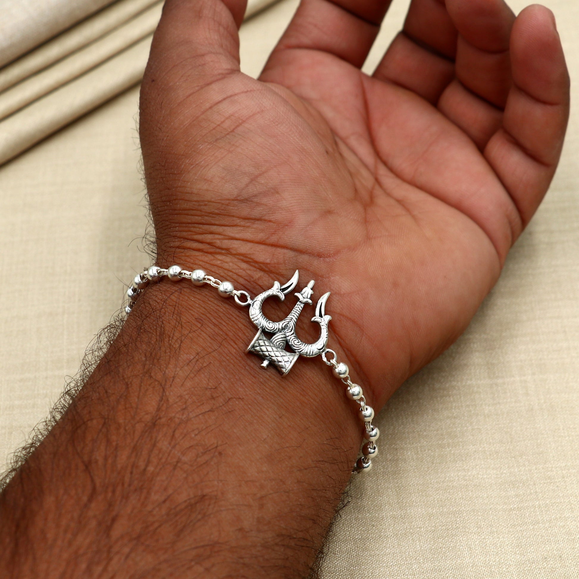 925 sterling silver Trishul and black tulsi beads bracelet by TRIBAL ORNAMENTS, unisex design, 7.5 inches long.
