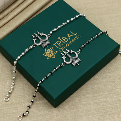 Sterling silver Trishul bracelet with black tulsi beads, unisex design by Tribal Ornaments, 7.5-inch length, traditional Rakhi style