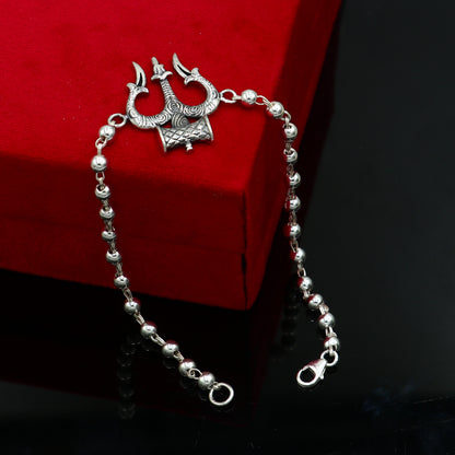 Sterling silver Trishul bracelet with black tulsi beads, unisex design by TRIBAL ORNAMENTS, 7.5-inch Trident-inspired jewelry.