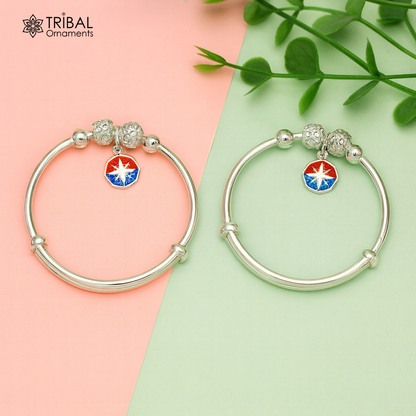 Unisex 925 sterling silver adjustable charm bangle bracelet with intricate tribal design, suitable for kids and babies.