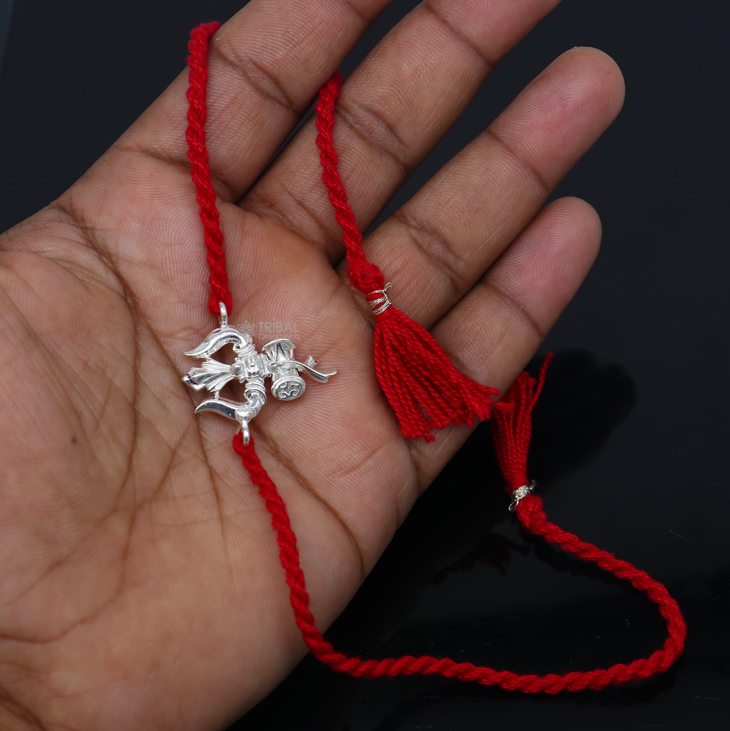 925 sterling silver Trishul bracelet by TRIBAL ORNAMENTS featuring a trident pendant, designed for Rakshabandhan festival.
