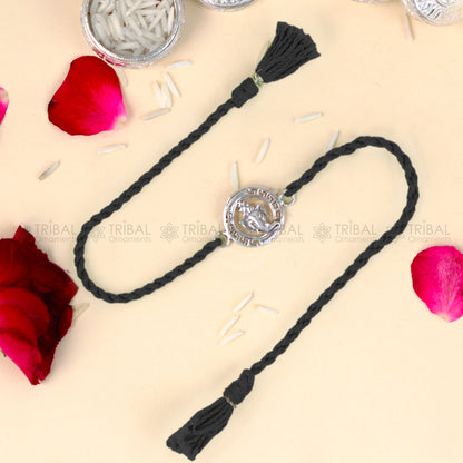 925 Sterling silver Ganesha design thread bracelet with red thread and pendant, by TRIBAL ORNAMENTS.