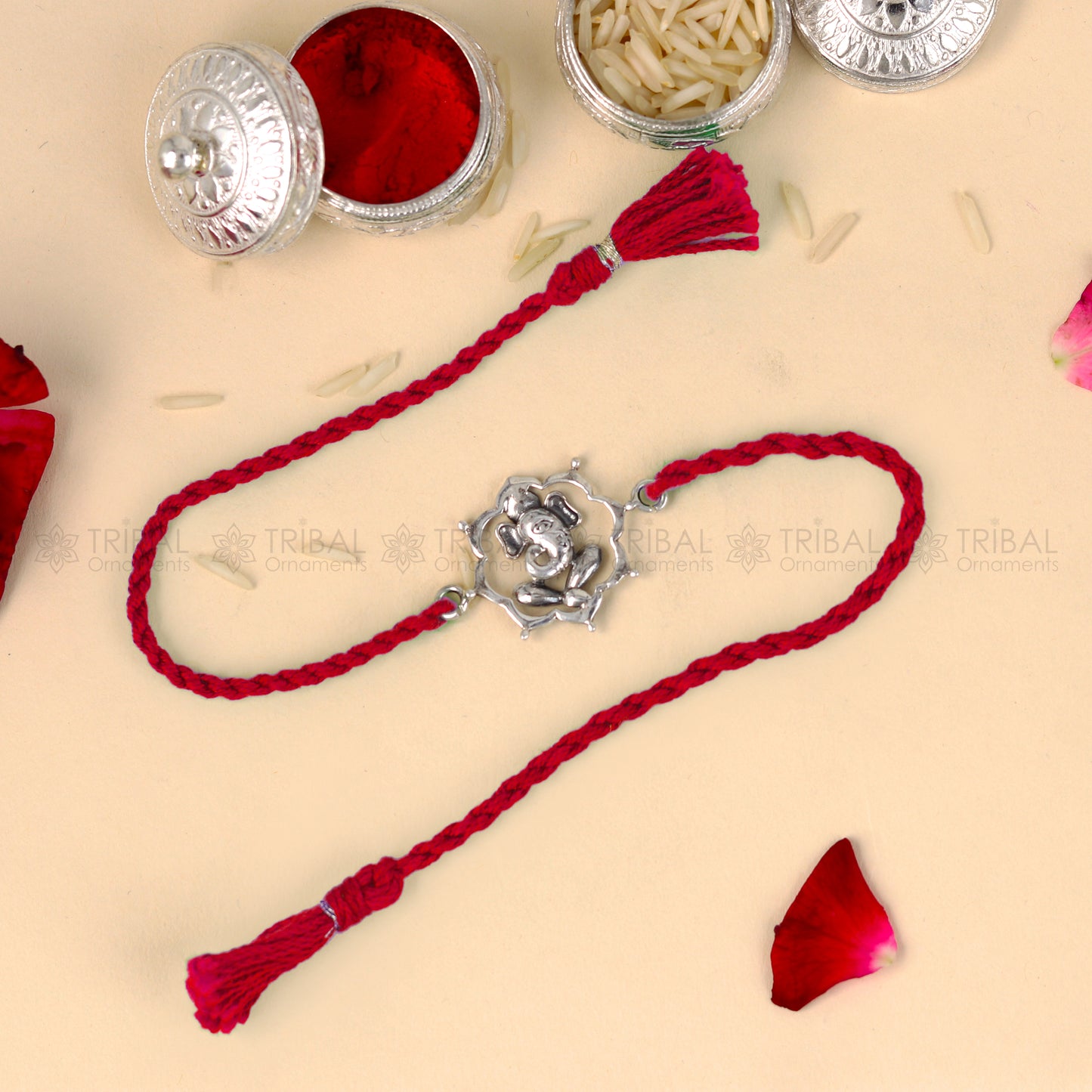 925 Sterling silver Ganesha design thread bracelet with red thread and intricate pendant, crafted by TRIBAL ORNAMENTS.