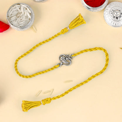 925 Sterling silver Ganesha design thread bracelet with red thread and pendant, crafted by TRIBAL ORNAMENTS.