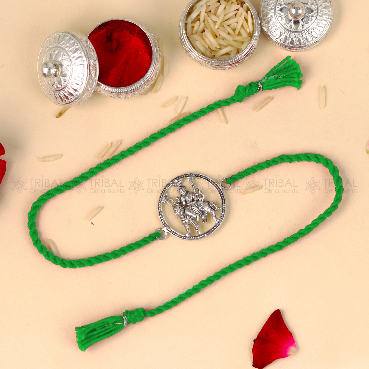 Sterling silver Lord Bhawani Maa Duga Maa design thread bracelet with red thread from TRIBAL ORNAMENTS.