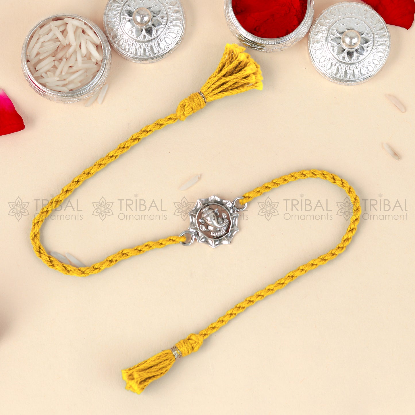 925 Sterling silver Lord Ganesha design thread bracelet with red thread and pendant from TRIBAL ORNAMENTS.