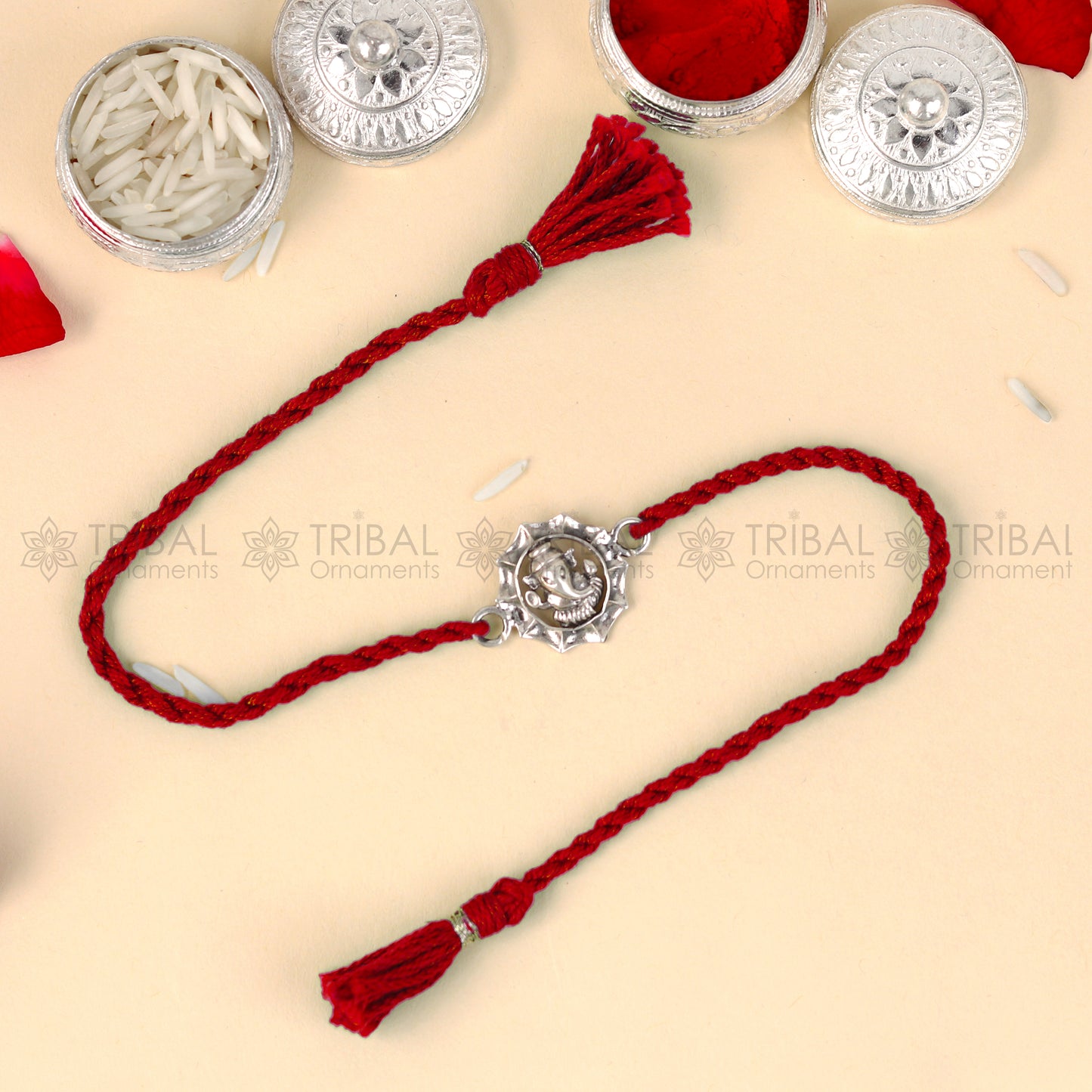 925 Sterling silver Lord Ganesha thread bracelet with red thread and intricate Ganesha pendant design by TRIBAL ORNAMENTS