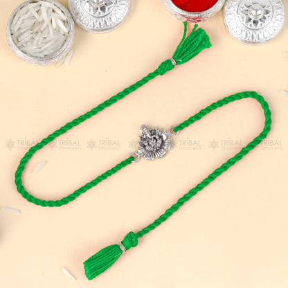 925 Sterling silver Lord Ganesha thread bracelet with red thread and Ganesha pendant by TRIBAL ORNAMENTS.