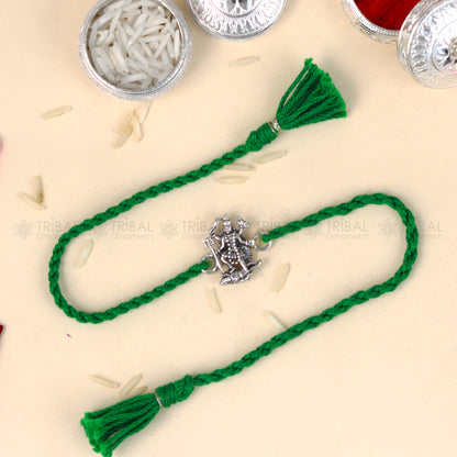 925 Sterling silver Lord Kali Maa with Shiv Ji design thread Rakhi bracelet by TRIBAL ORNAMENTS featuring red thread and intricate silver detailing