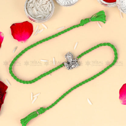 925 Sterling silver Lord Krishna design thread rakhi bracelet with red thread, featuring intricate Krishna pendant by TRIBAL ORNAMENTS