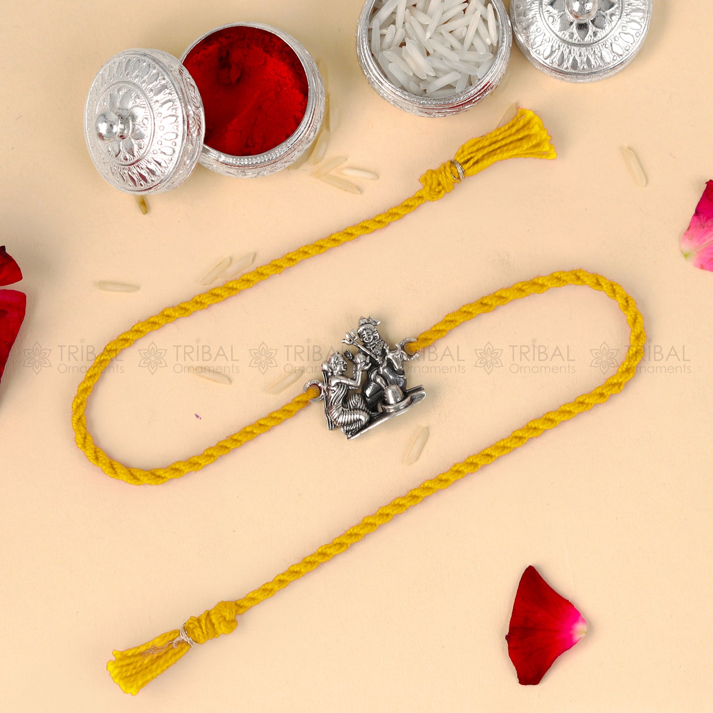 925 Sterling silver Lord Parwati and Nandi Maharaj bracelet with Shiva Lingam pendant on red thread, designed by TRIBAL ORNAMENTS.