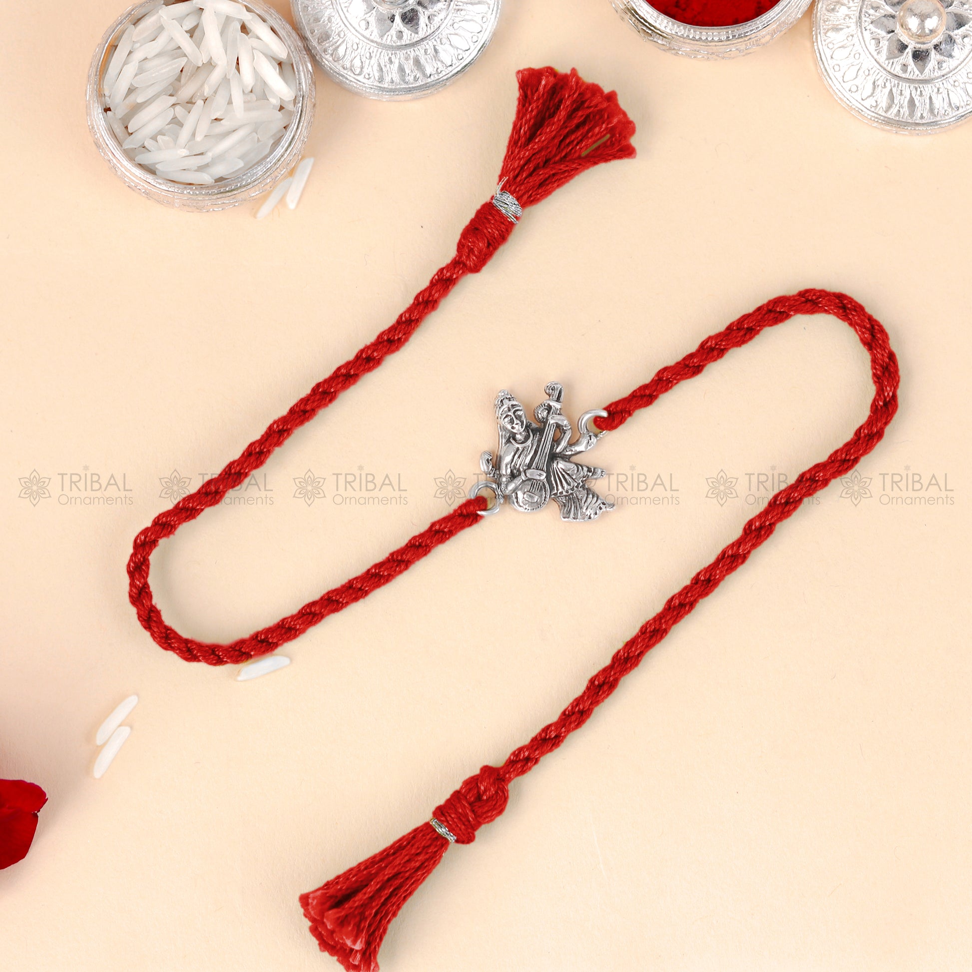 925 Sterling silver Lord Sarashwati Maa thread rakhi bracelet with veena design by TRIBAL ORNAMENTS.
