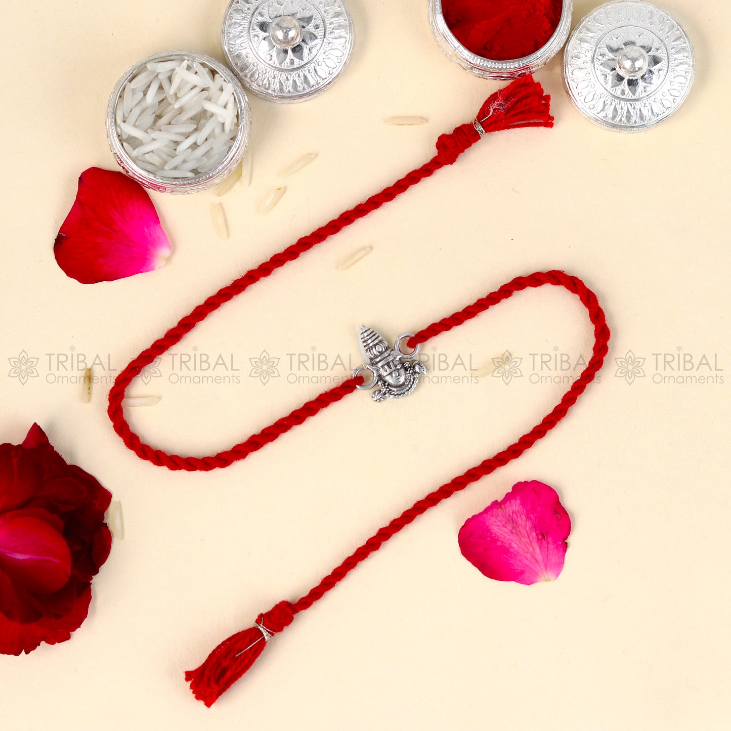 925 Sterling silver Lord Tirupati Bala Ji Venkateswara design thread rakhi bracelet with red thread and intricate pendant from TRIBAL ORNAMENTS