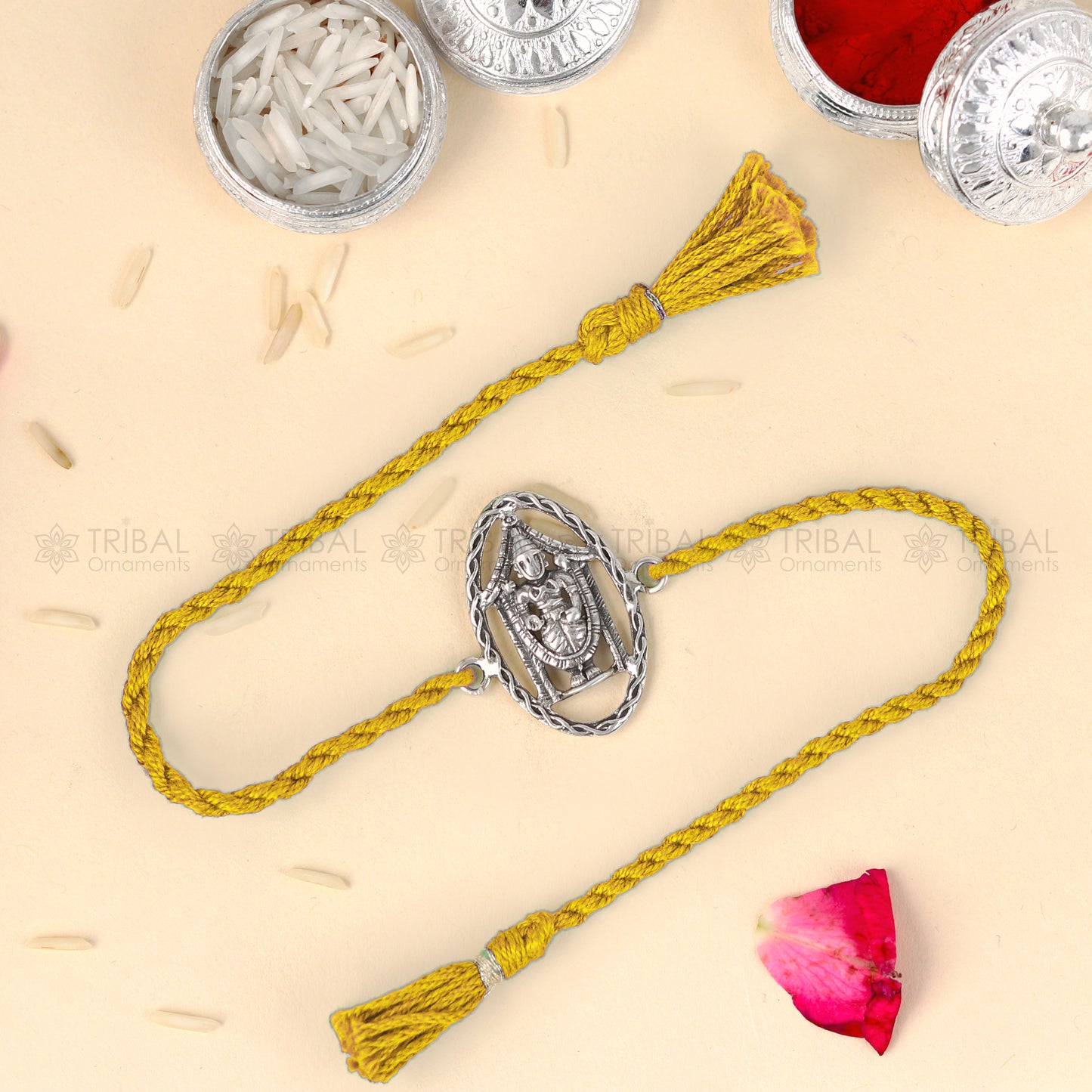 Sterling silver Lord Tirupati Bala Ji Venkateswara design bracelet with red thread, crafted by TRIBAL ORNAMENTS.