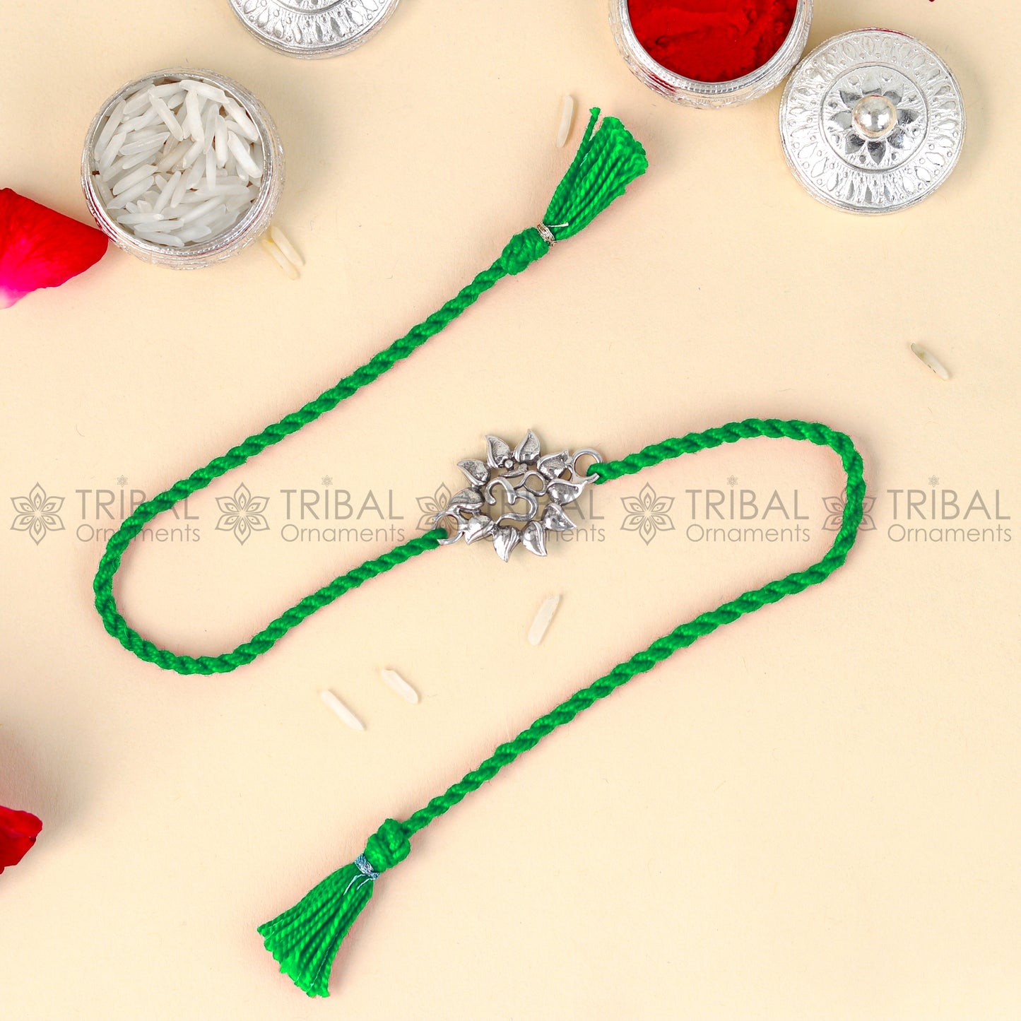 925 Sterling silver thread rakhi bracelet with OM design pendant and red thread, by TRIBAL ORNAMENTS.