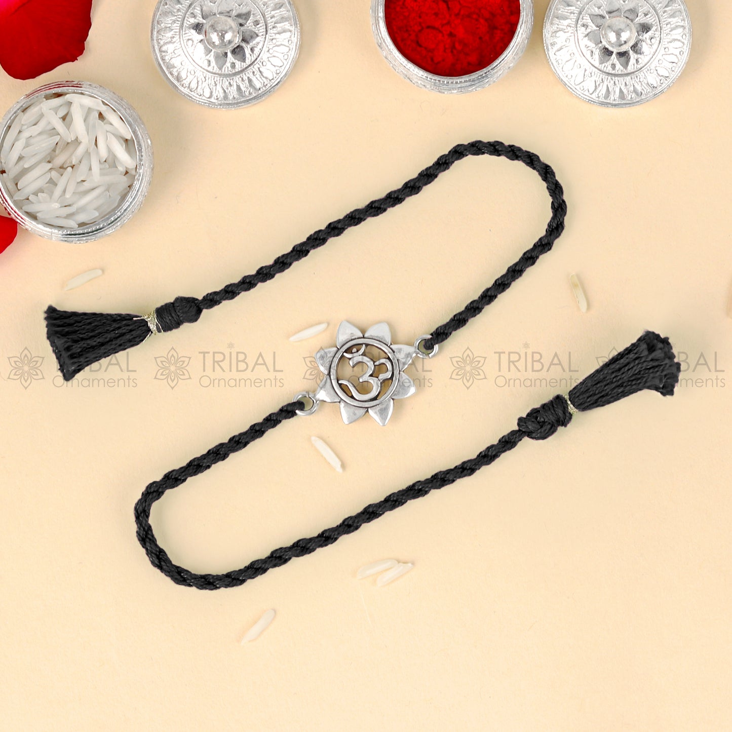 925 Sterling silver om design thread bracelet with red thread and pendant, crafted by TRIBAL ORNAMENTS.