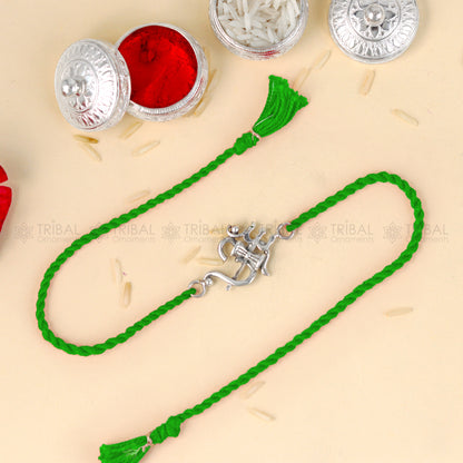 Sterling silver Om with trishul pendant thread bracelet by Tribal Ornaments on red thread, traditional religious jewelry for men and women