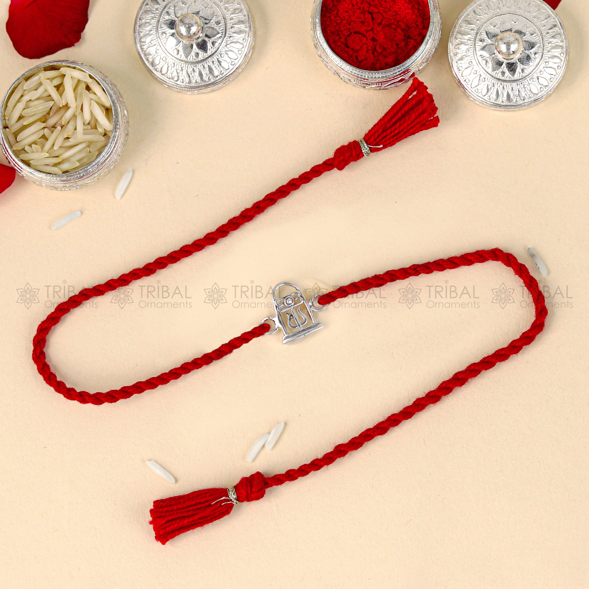 925 Sterling silver Siva Lingam design thread bracelet with red thread and pendant, crafted by TRIBAL ORNAMENTS.