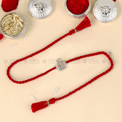 925 Sterling silver Siva Lingam design thread bracelet with red thread and pendant, crafted by TRIBAL ORNAMENTS.