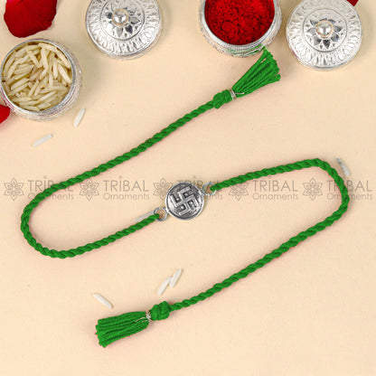925 Sterling silver Swashtik design thread bracelet with red thread and pendant by TRIBAL ORNAMENTS