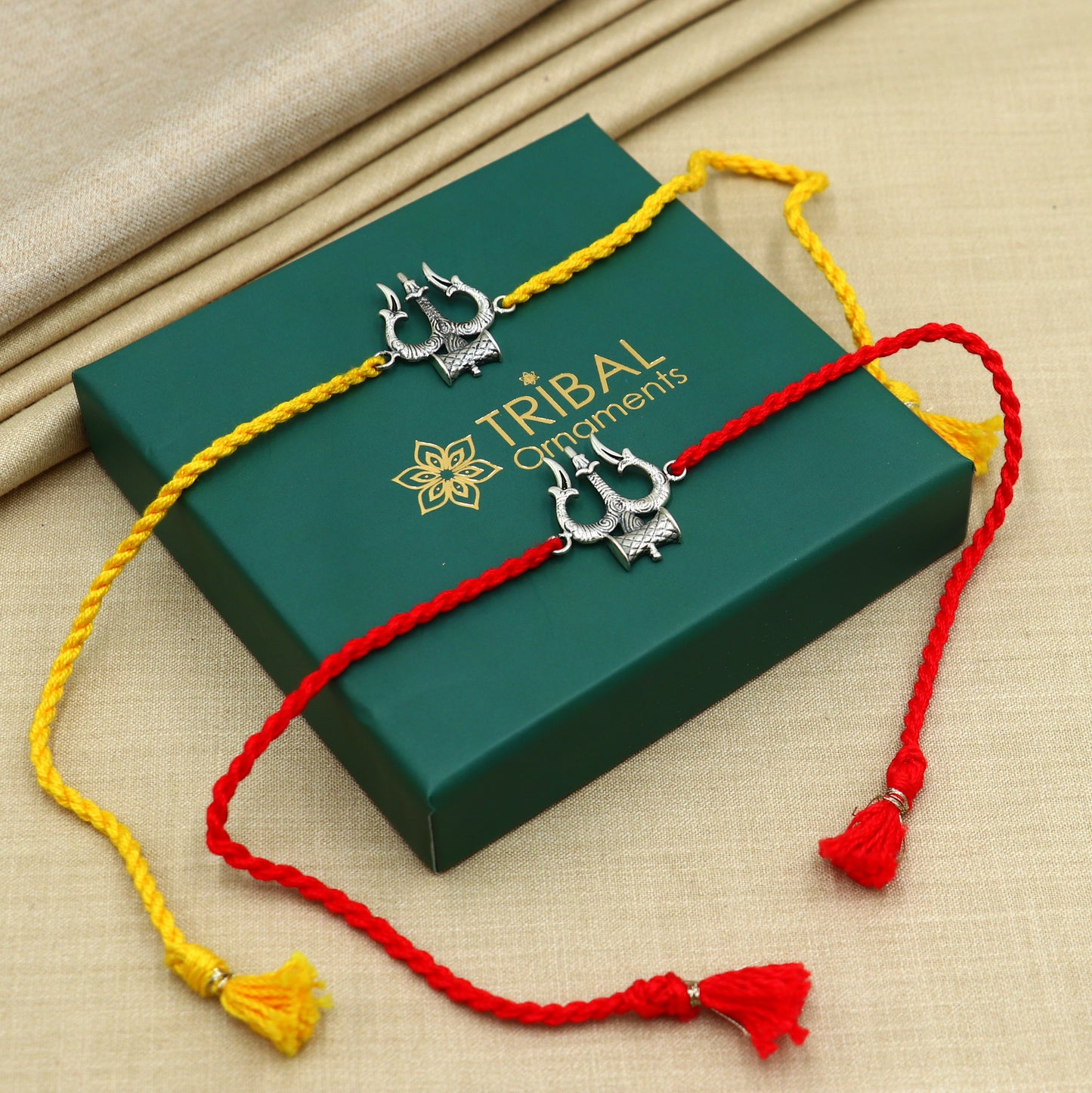 Sterling silver Trishul bracelet by TRIBAL ORNAMENTS featuring a trident design, perfect for Rakshabandhan celebrations.