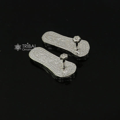 Sterling silver handmade Charan Paduka slippers for idol Krishna, Laddu Gopala, or Vishnu Narayana in traditional puja art style.
