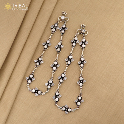 Sterling silver 10.5-inch antique design ankle bracelet with white stone embellishments, featuring intricate tribal jewelry details.