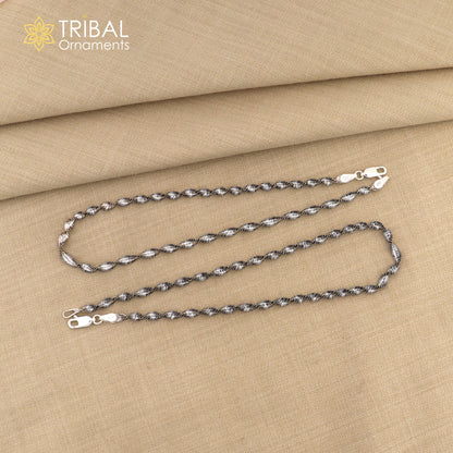 Sterling silver 10.5-inch twisting chain anklet bracelet by Tribal Ornaments, lightweight and stylish ankle jewelry.