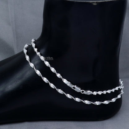 Sterling silver 10.5-inch twisting chain anklet bracelet by TRIBAL ORNAMENTS, lightweight ankle jewelry with intricate design.