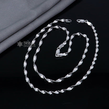 Sterling silver 10.5-inch twisting chain anklet bracelet by Tribal Ornaments, lightweight ankle jewelry with a sleek, elegant design.