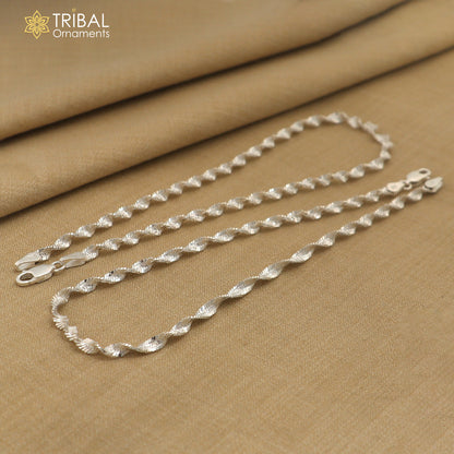 Sterling silver twisting chain anklet bracelet by TRIBAL ORNAMENTS, lightweight and stylish ankle jewelry, 10.5 inches long.
