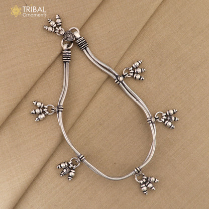 Sterling silver vintage snake chain ankle bracelet with hanging bells, tribal-inspired jewelry by Tribal Ornaments.