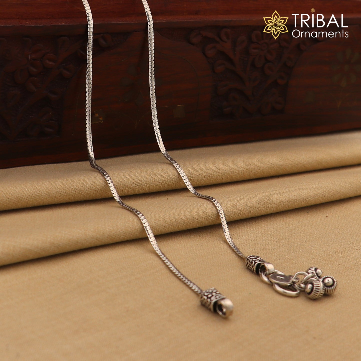 Lightweight 10.5-inch sterling silver chain anklet by TRIBAL ORNAMENTS, featuring a delicate foot jewelry design.