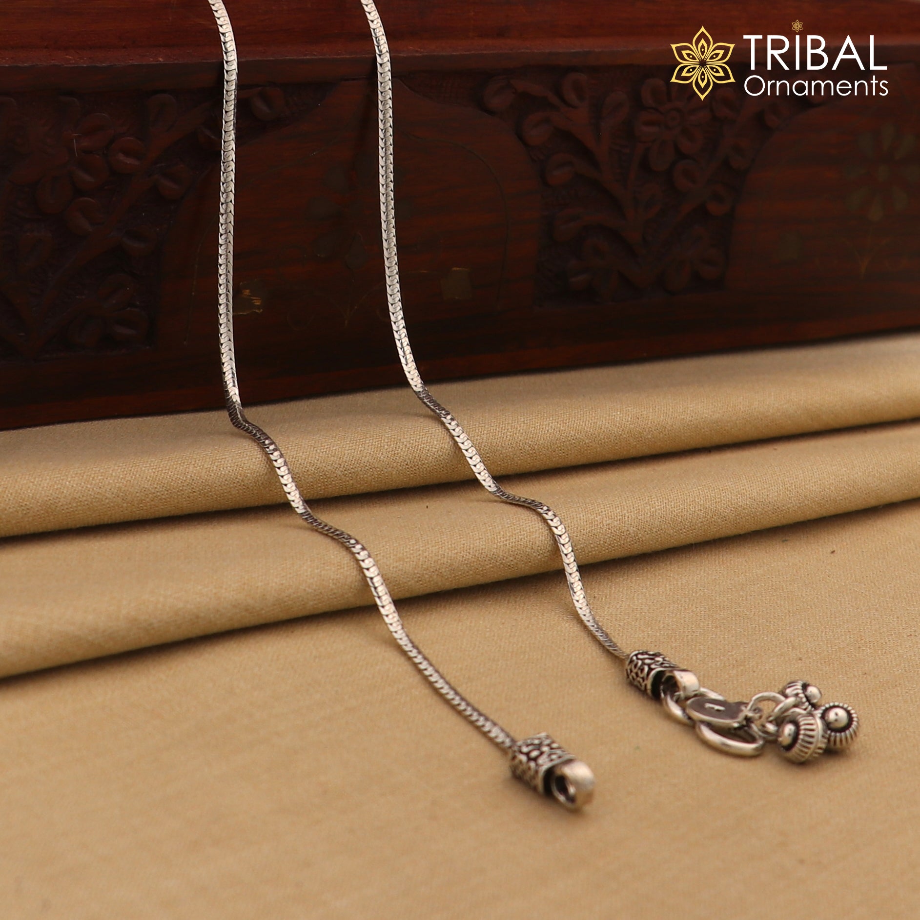 Lightweight 10.5-inch sterling silver chain anklet by TRIBAL ORNAMENTS, featuring a delicate foot jewelry design.