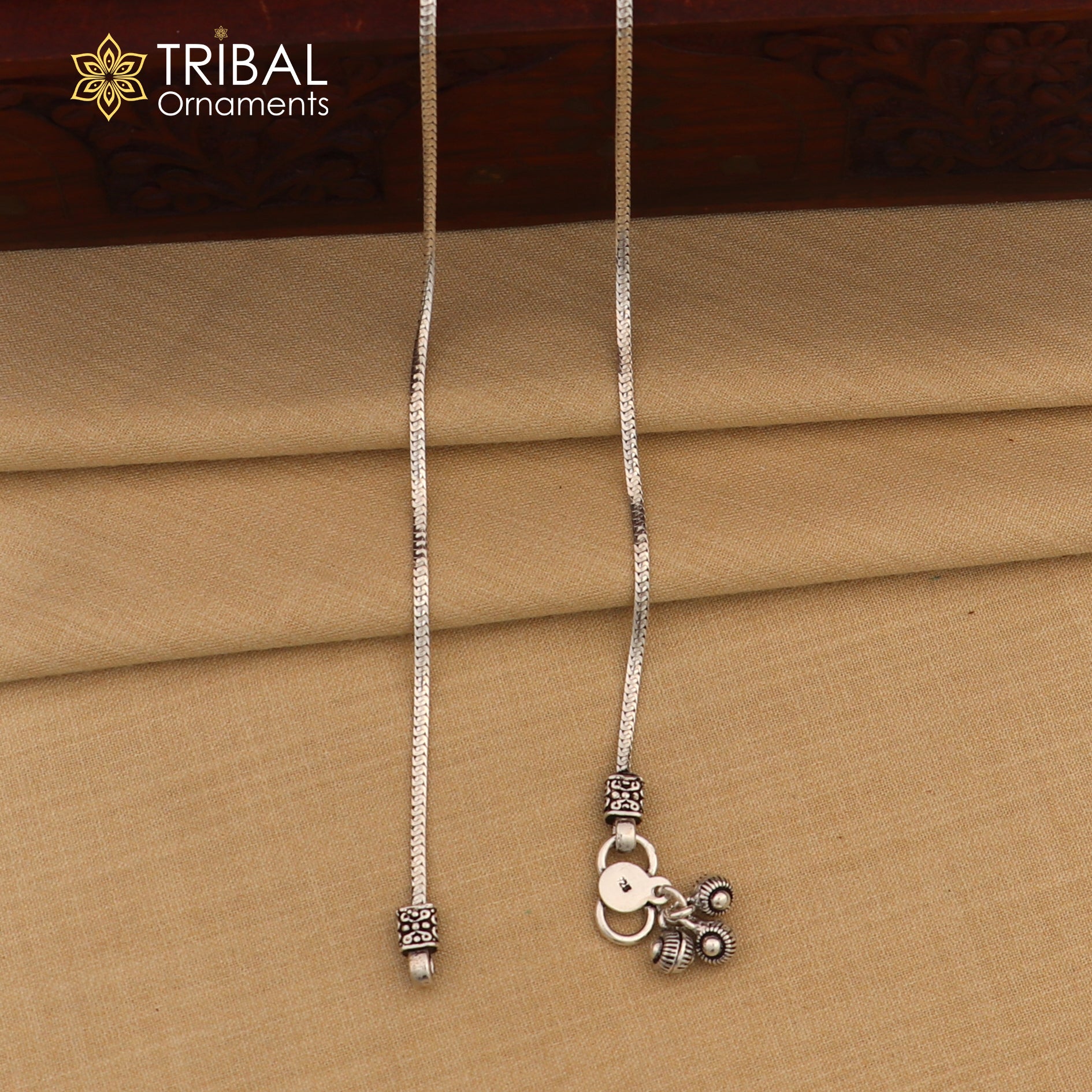 Lightweight 10.5-inch sterling silver chain anklet from TRIBAL ORNAMENTS, stylish foot jewelry with delicate links.