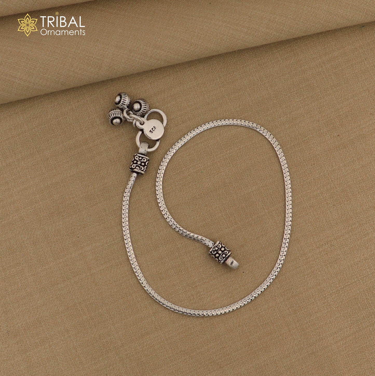 Lightweight 10.5-inch sterling silver chain anklet by TRIBAL ORNAMENTS, stylish foot jewelry with intricate link design.