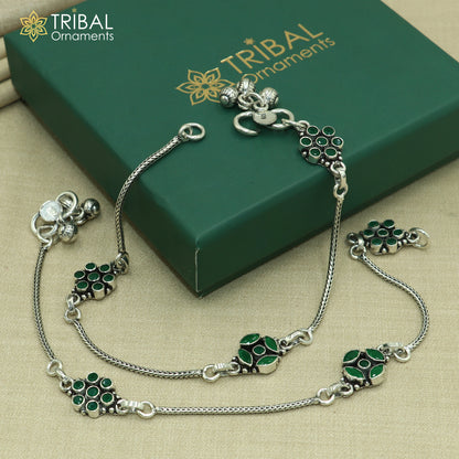 Sterling silver green stone chain anklet from Tribal Ornaments, featuring a delicate foot bracelet with a vibrant green gemstone.