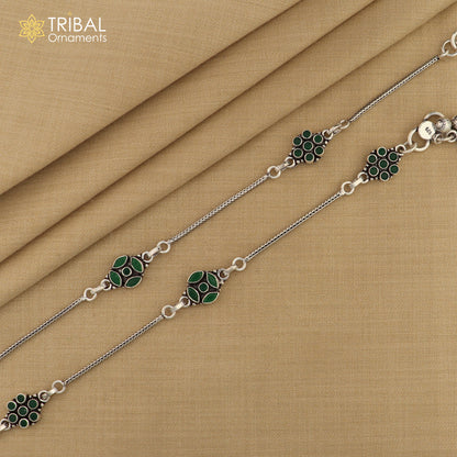 Sterling silver green stone chain anklet from TRIBAL ORNAMENTS, featuring a delicate foot bracelet design with green gemstone accents.