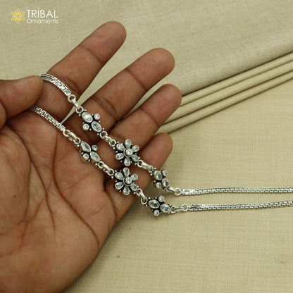 Sterling silver 10-inch chain anklet with white stones, tribal ornaments design, foot bracelet for stylish ankle decoration.