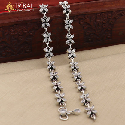 Sterling silver flower design anklet with white stones, 10-inch foot bracelet from Tribal Ornaments, showcasing intricate jewelry details.