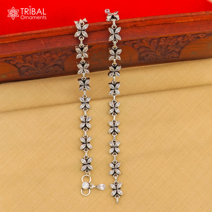 Sterling silver anklet with white stone flower design from Tribal Ornaments, 10-inch foot bracelet showcasing intricate floral details.