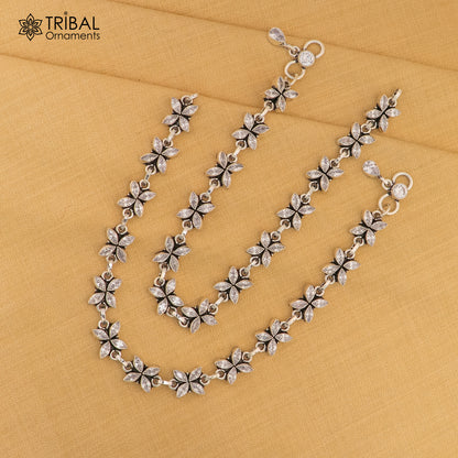 Sterling silver anklet with white stone flower design by Tribal Ornaments, 10-inch foot bracelet with intricate floral pattern.