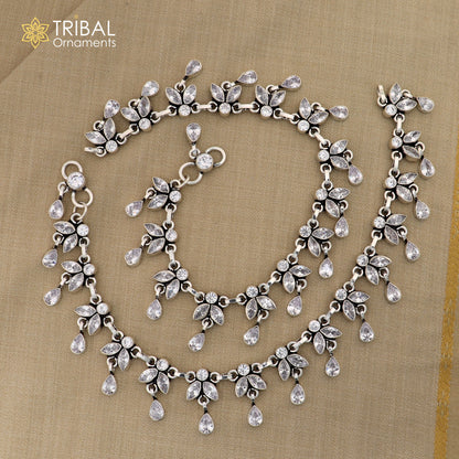 Sterling silver 10-inch anklet with white stone flower design from Tribal Ornaments, showcasing delicate floral jewelry for the ankle.